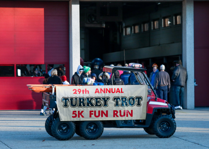 img-sn-community1-700-1 29th Annual Turkey Trot 5K Fun Run outside a fire station.